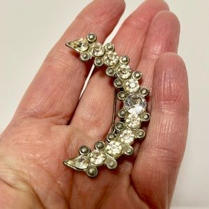 Vintage rhinestone crescent shaped brooch.